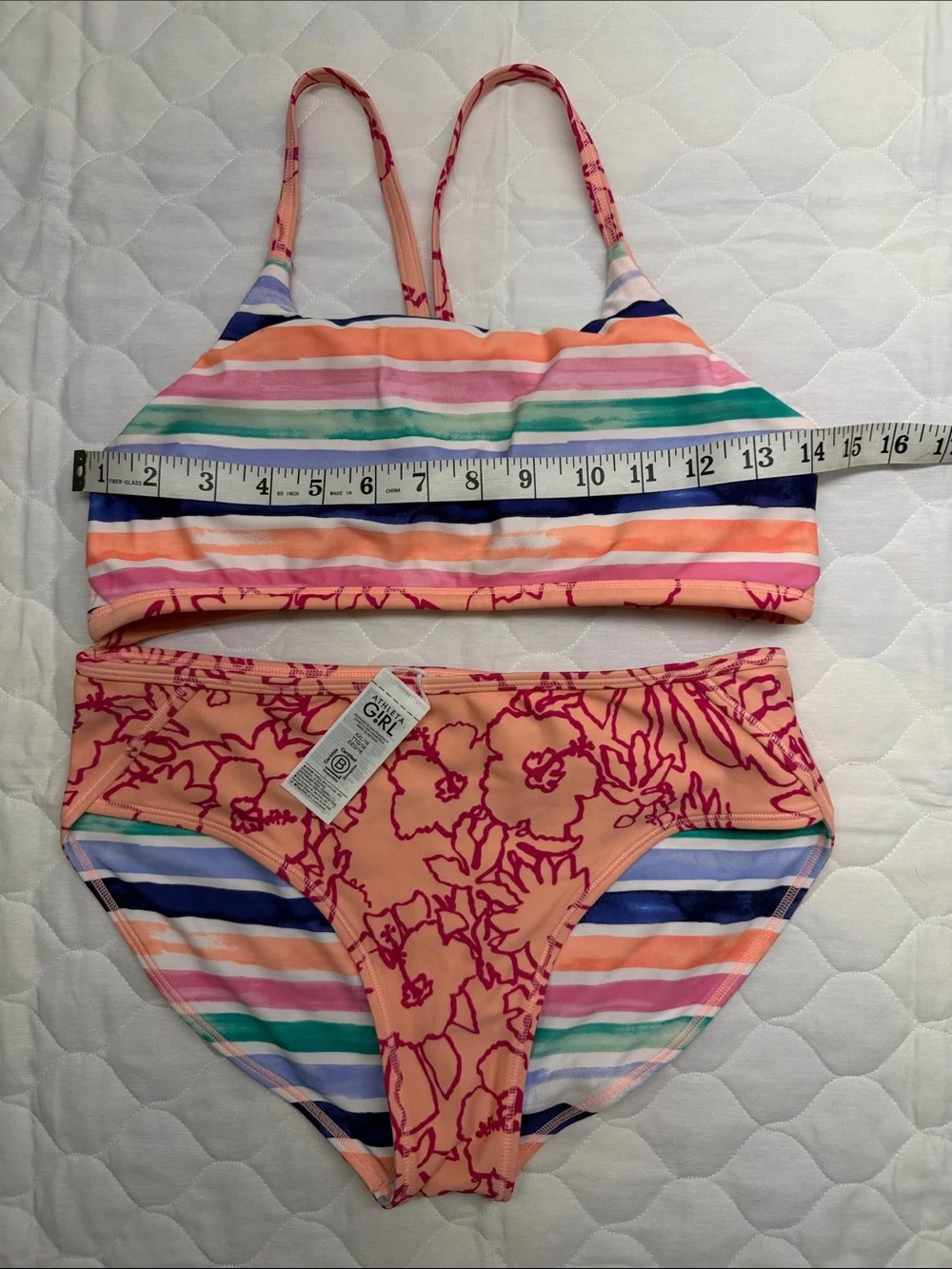 This Athleta Girl reversible bikini set high neck top and mid-rise bottoms